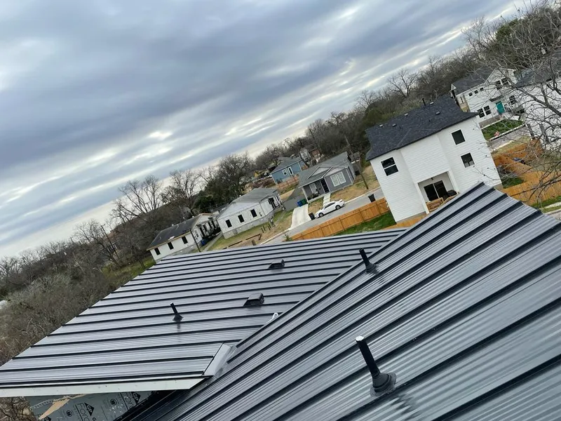 Standing seam metal roof panels with vents for Skylight Repair in West Clarkston-Highland
